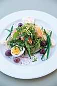 Smoked salmon with rocket, eggs and green beans