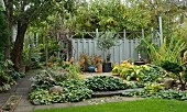 Autumn garden with many different flowerbeds