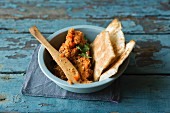 A grilled pepper, carrot and red lentil spread