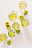 Glasses of gin with limes (seen from above)