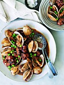 Clams with anchovies and peas