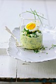 Egg salad with chives in a glass