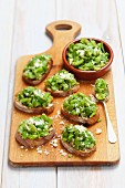 Crostini topped with broadbeans, garlic and Parmesan