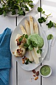 White asparagus with herb sauce and hazelnut potatoes