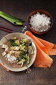 Vegan miso soup with tofu, pointed cabbage and roasted sesame seeds