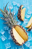 A sliced pineapple on ice