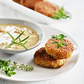 Quinoa cakes with a herb and mushroom sauce