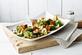 Vegan stir-fried broccoli with seitan and cashew nuts