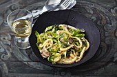 Creamy Spätzle (soft egg noodles from Swabia) with savoy cabbage and mushrooms