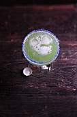 An exotic beer cocktail with kiwi