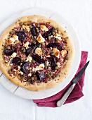 A beetroot, goat's cheese and caper pizza