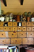 Old apothecary cabinet in country-house kitchen