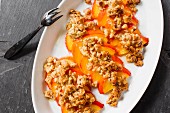 Peaches gratinated with walnuts