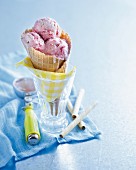 Strawberry ice cream in a cone