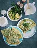 Herb pancakes with avocado and rocket