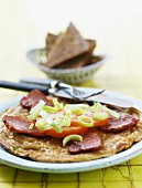 Omelette with bacon, tomatoes and leek