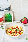 Pasta with fresh tomatoes and strawberries