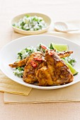 Chicken wings with curry, chillis and herb rice