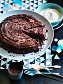 Chocolate, prune and walnut cake with chocolate and Sherry ganache