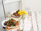 Green bean and lentil salad on a white table
