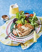 Yellow-tail mackerel with a sesame seed crust with a green Thai curry sauce and a salad