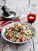 Risotto with cherry tomatoes, courgettes and bacon