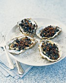 Oysters Kill Bill (oven-baked oysters with black pudding crumble)