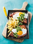 Gammon steaks with fried eggs and chips