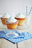 Cupcakes with white icing and blue sugar