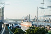 Hamburg harbour: view of Rickmer Rickmers, Cap San Diego and the Elbphilharmonie from the U-Bahn bridge Landungsbrücken
