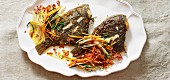 Plaice with spicy bacon and julienned vegetables