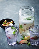 White wine sangria with white peaches and mint