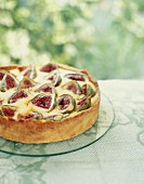 Fig and almond tart on a garden table