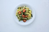 Tagliatelle with fennel, capers and tomatoes (seen from above)