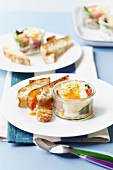 Baked eggs with spinach, tomatoes and ciabatta soldiers