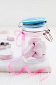 Homemade sweets in a flip-top jar with a taft bow