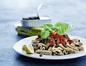 Wholemeal pasta with sardine sauce, capers and chilli rings
