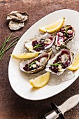 Oysters with beetroot salsa and lemon