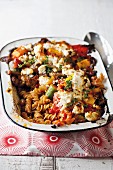Vegetarian pasta bake with vegetables and ricotta