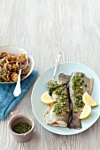 Baked trout with parsley and lemon gremolata and vegetables