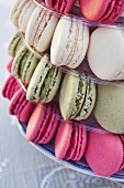 Assorted macaroons on a tiered cake stand