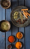 Various spices in bowls and on a plate