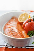Raw Arctic char with tomatoes and lemon