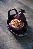 A baked red onion field with millet