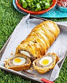 Sausage and egg pastry plait