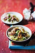 Stir-fried sweet and sour pork with pepper noodles in two bowls