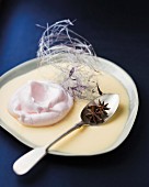 A floating island with star anise and spun sugar