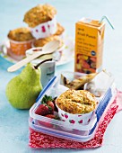 Carrot and lemon muffins with pears in a lunch box