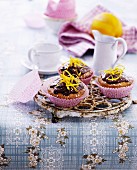 Cupcakes with chocolate cream and orange zest