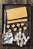 Homemade toffees on a baking tray